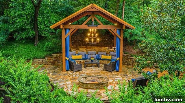Outdoor cabana retreat by the fireplace