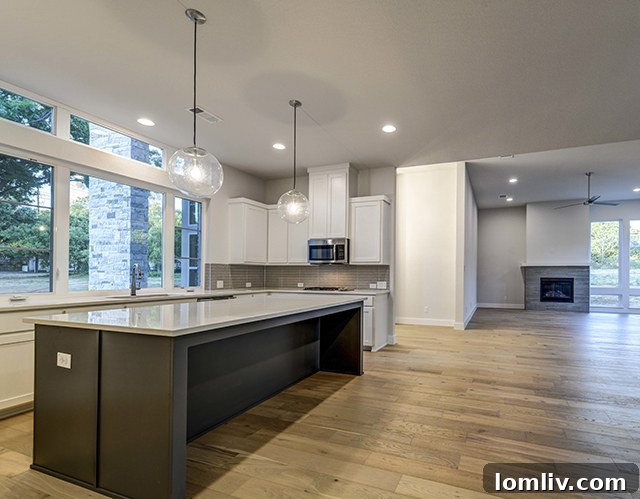 Scott Homebuilders Revitalizes Colleyville with Midcentury Modern Masterpieces 6 Modern Kitchen with Quartz Island and Shaker Cabinetry