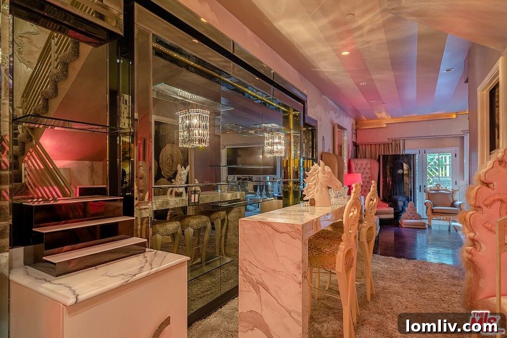 Pink and gold living room with Chanel branded rug and lavish decor
