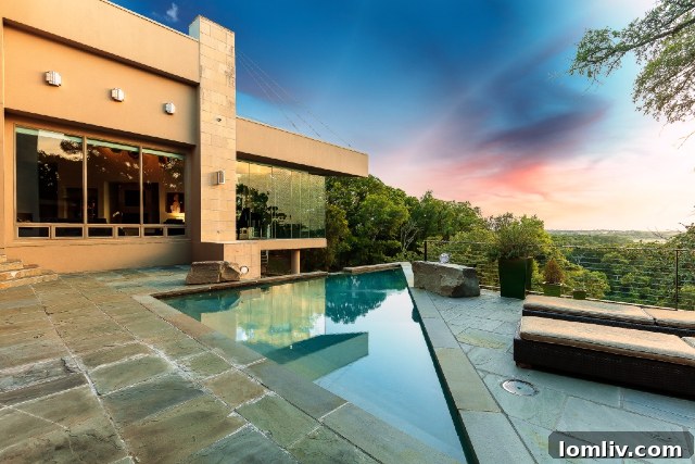 Uniquely shaped pool at 2906 Shadow Drive, demonstrating creative pool design possibilities.