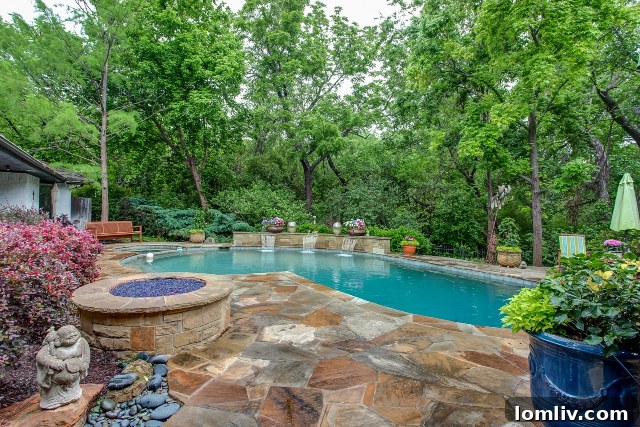 Elegant pool designed with a focus on shade, enhancing comfort and enjoyment in a sunny environment.