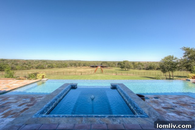 Infinity edge pool with breathtaking views of a horse ranch from 321 Verna Trail.