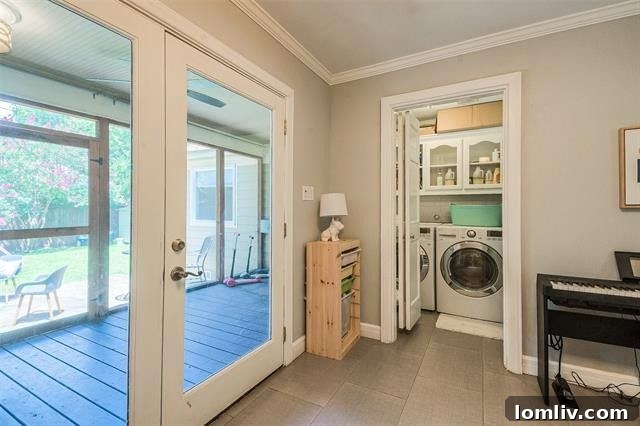 Albany Shaw's Insider Scoop on This Lakewood Hills Tudor Gem 11 Fenced backyard with lush greenery and a cozy fire pit area