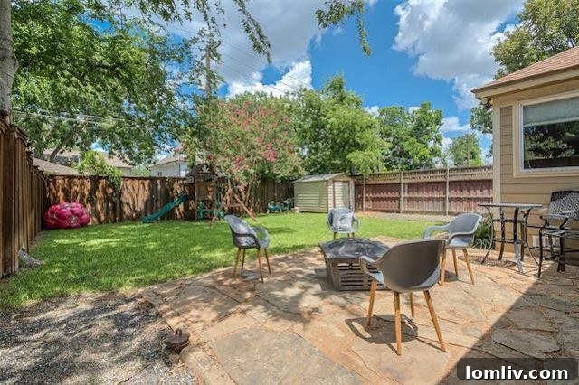 Albany Shaw's Insider Scoop on This Lakewood Hills Tudor Gem 12 Inviting patio area within a private backyard, perfect for outdoor dining