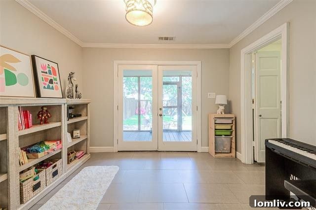 Albany Shaw's Insider Scoop on This Lakewood Hills Tudor Gem 5 Spacious hallway connecting living areas in a well-lit home