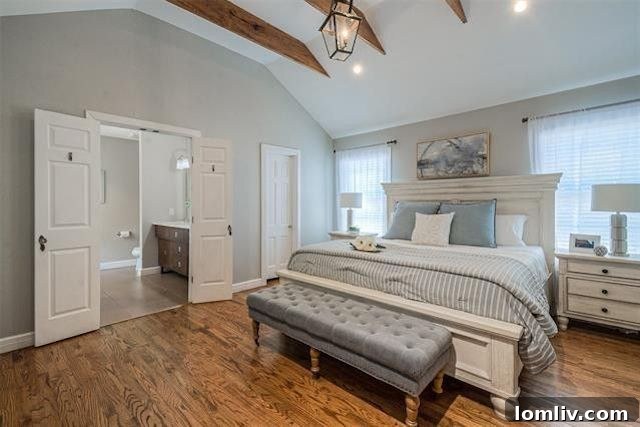 Albany Shaw's Insider Scoop on This Lakewood Hills Tudor Gem 8 Luxurious principal bedroom with vaulted ceilings and exposed beams