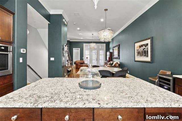 Elegant bedroom with ample natural light, showcasing the refined interiors of a Dallas urban townhome.