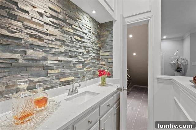 Tranquil five-piece master bath with elegant finishes.