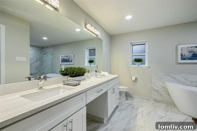 Stylish master bathroom with designer tiles and modern fixtures.