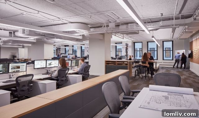 An inviting, modern office space with collaborative seating, representing a hub for innovation and teamwork.