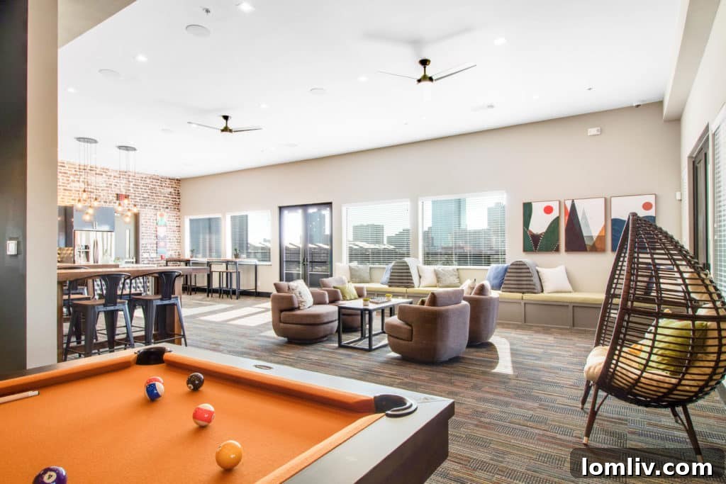 A stylish and spacious lounge area designed for relaxation and informal meetings in an office setting.