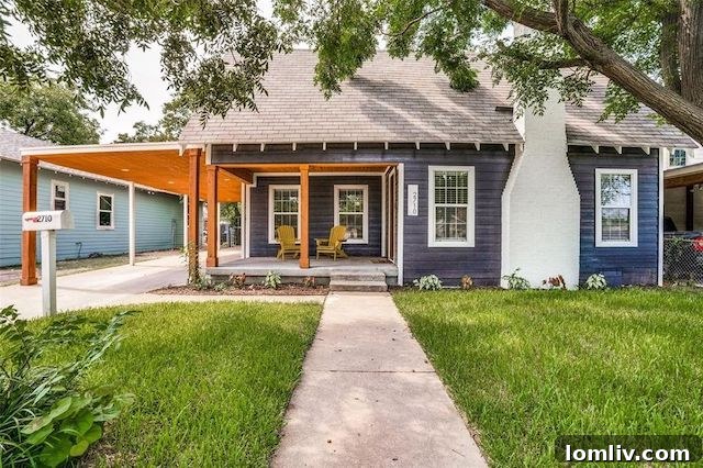 Charming updated historic home in North Oak Cliff Dallas, featuring a welcoming exterior.