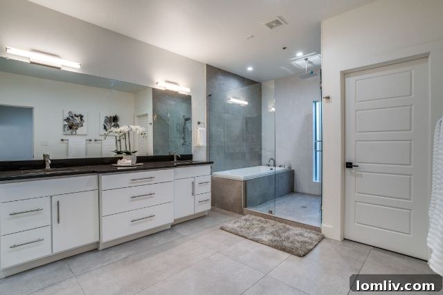 Daniel Quintana Tapped to Represent Bishop Arts' Prime Three-Story Complex 17 Elegant primary bathroom with freestanding soaking tub