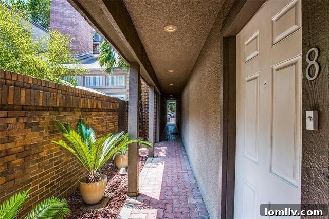 Bright and airy living room with a step-down design and fireplace at 4333 Bowser Avenue