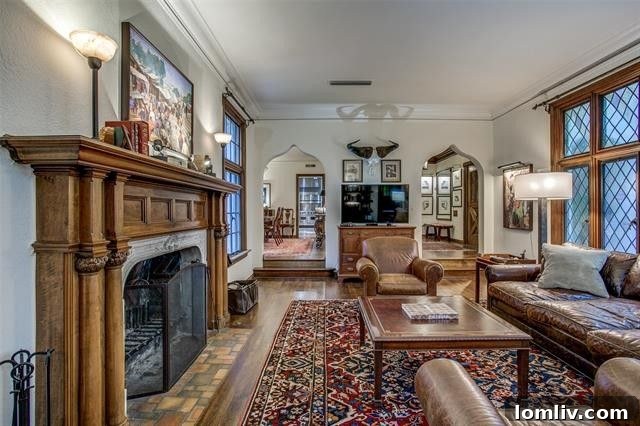 Luxurious and inviting living area showcasing original architectural details