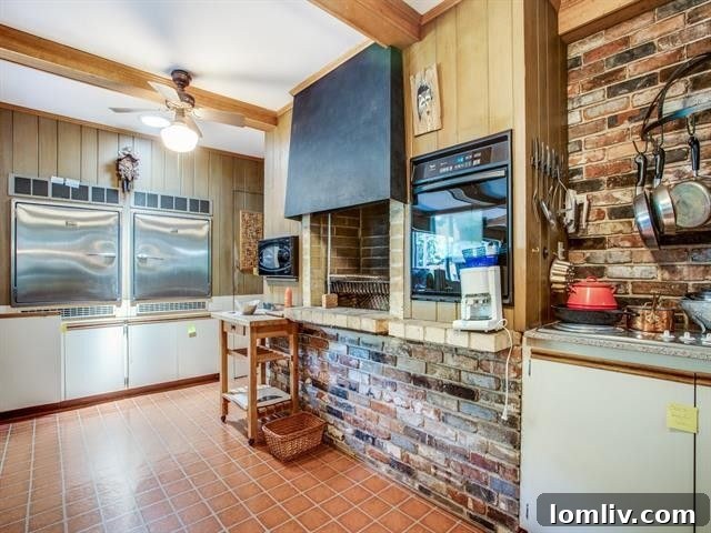 A view of the kitchen, highlighting the unique mosaic peninsula.