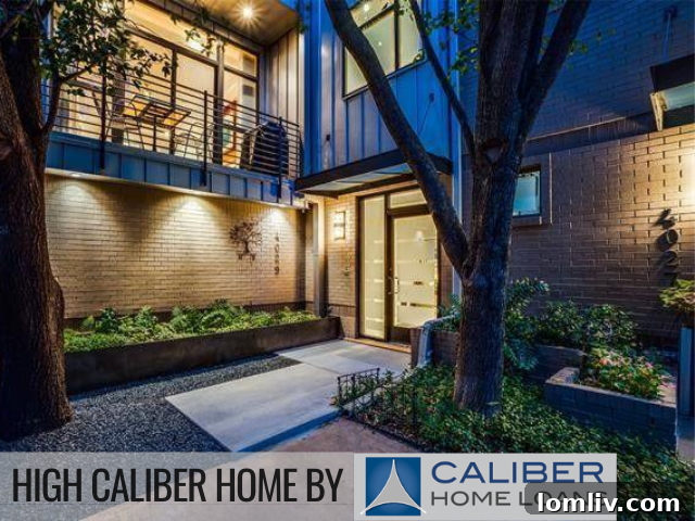 Modern Dallas townhome exterior with cement pads and corten planter