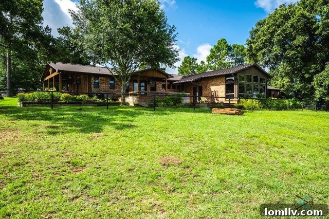 East Texas Ranch A Horse's Dream Playground 7 Modern and inviting open kitchen with ample counter space