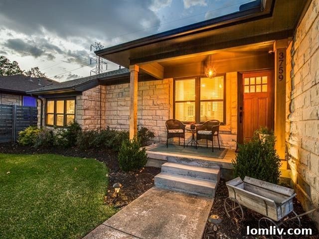 Classic Austin stone exterior of the home on Bolivar Drive, showcasing timeless Texas architecture