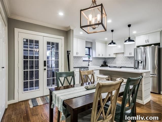 Updated kitchen featuring a charming farmhouse sink, modern appliances, and ample cabinet space