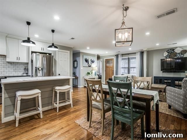 Elegant dining area with plenty of natural light, offering a welcoming space for meals