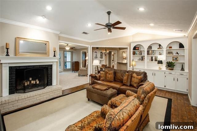 Luxurious outdoor kitchen featuring a built-in grill and ample counter space, perfect for al fresco dining