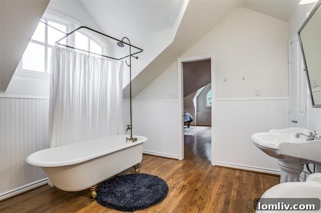 Historic reclaimed bathtub in a renovated bathroom