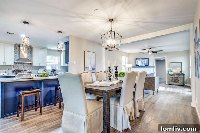 Luxurious Open-Concept Kitchen with Farmhouse Sink and Quartz Counters