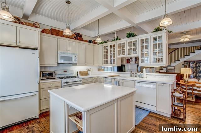 Interior living space with exposed beams and hardwood floors in Uptown Dallas house