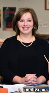 Portrait of Morgan Davis Gieringer, Head of Special Collections at UNT Libraries, an expert in archival management and preservation