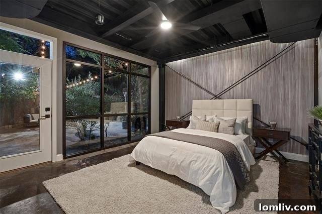 Elegant and comfortable guest bedroom with natural light.