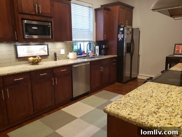 Dated kitchen cabinetry that felt dark and heavy before its renovation.