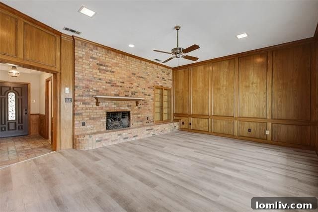 Modern kitchen with granite countertops, gas range, and double oven