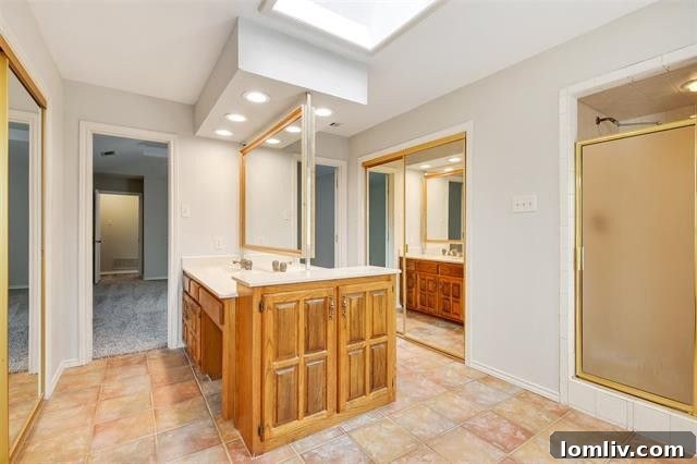 Bright and airy owner's bedroom providing ample space and comfort