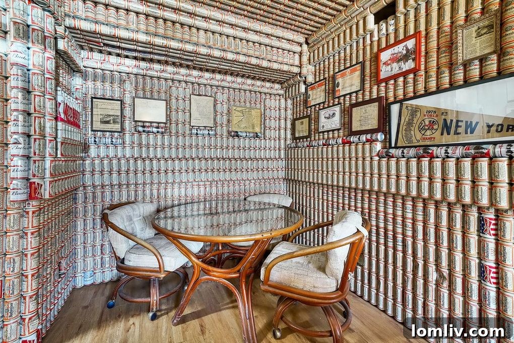 Dining area featuring extensive Budweiser beer can decoration on walls and ceiling