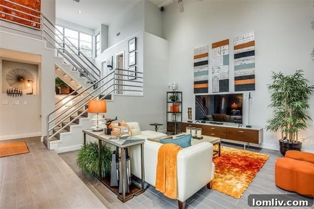Sleek gourmet kitchen with modern appliances and a cozy breakfast nook