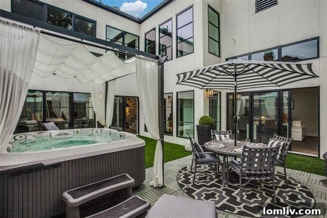 Exterior facade of the stunning 9123 Valley Chapel Lane contemporary home