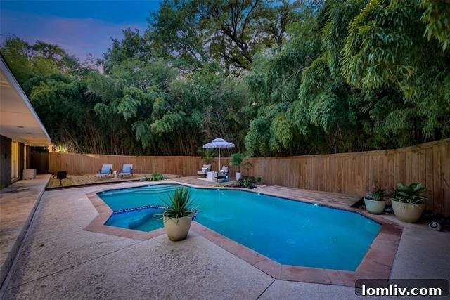 Stunning Backyard Oasis with Pool and Lush Trees in Claremont, Dallas