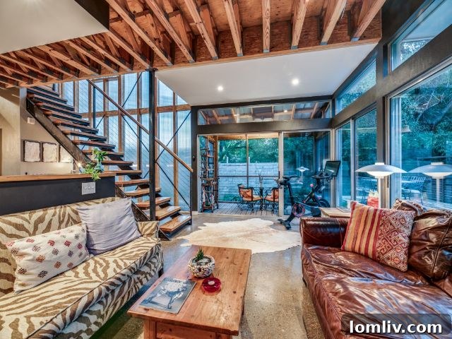 A screened balcony or porch at 8643 Groveland Drive, offering outdoor living space protected from elements.