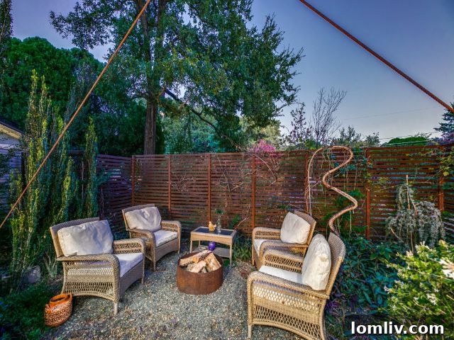 An outdoor fire pit area at 8643 Groveland Drive, perfect for entertaining and social gatherings.