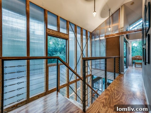Interior view of the living space at 8643 Groveland Drive, showing open design and natural light.