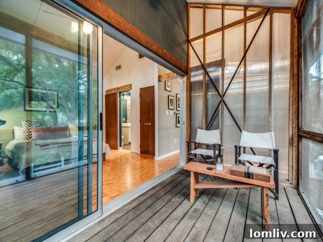 View of the open stairwell and interior connections at 8643 Groveland Drive, bathed in light.
