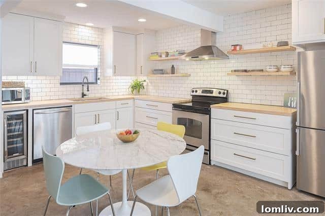 Contemporary kitchen design with subway tile backsplash and wine fridge