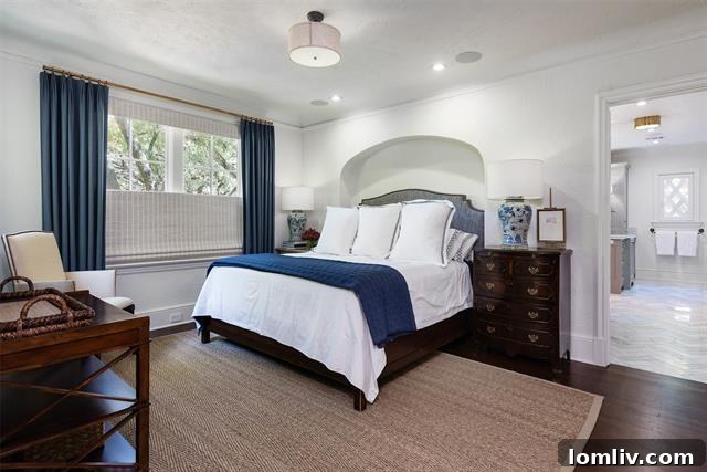 Cozy bedroom with ample natural light in the preserved 1116 Canterbury Court