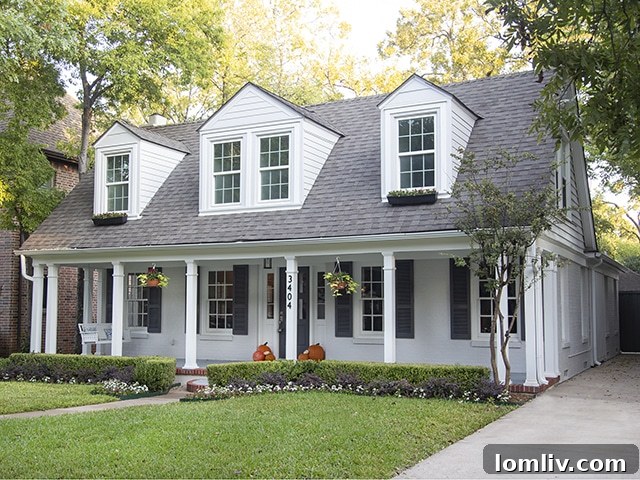 Elegantly renovated 1930s cottage at 3404 Purdue Avenue, University Park, featuring a charming front facade and lush landscaping