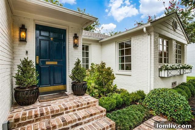 Luxurious 1950s East Dallas Home Exterior with Lush Landscaping
