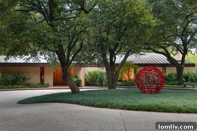 Architect Scott Lyons' iconic Texas Modern home at 10240 Gaywood Road, a significant Dallas architectural masterpiece, blending luxury with natural surroundings.