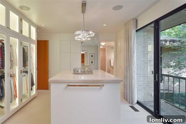 Architectural continuity and modern comfort blend seamlessly in the master suite and other private areas.