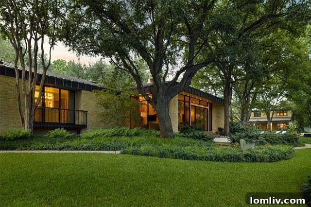 Aerial perspective of the luxurious 10240 Gaywood Road estate, emphasizing its privacy, sprawling grounds, and prestigious neighborhood.
