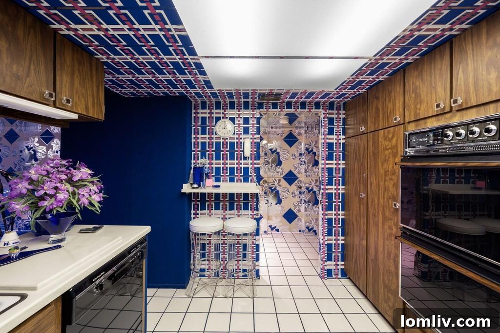 A room displaying two distinct wallpaper patterns side-by-side